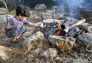 stonebury_learning_marshmallow_boy_campfire